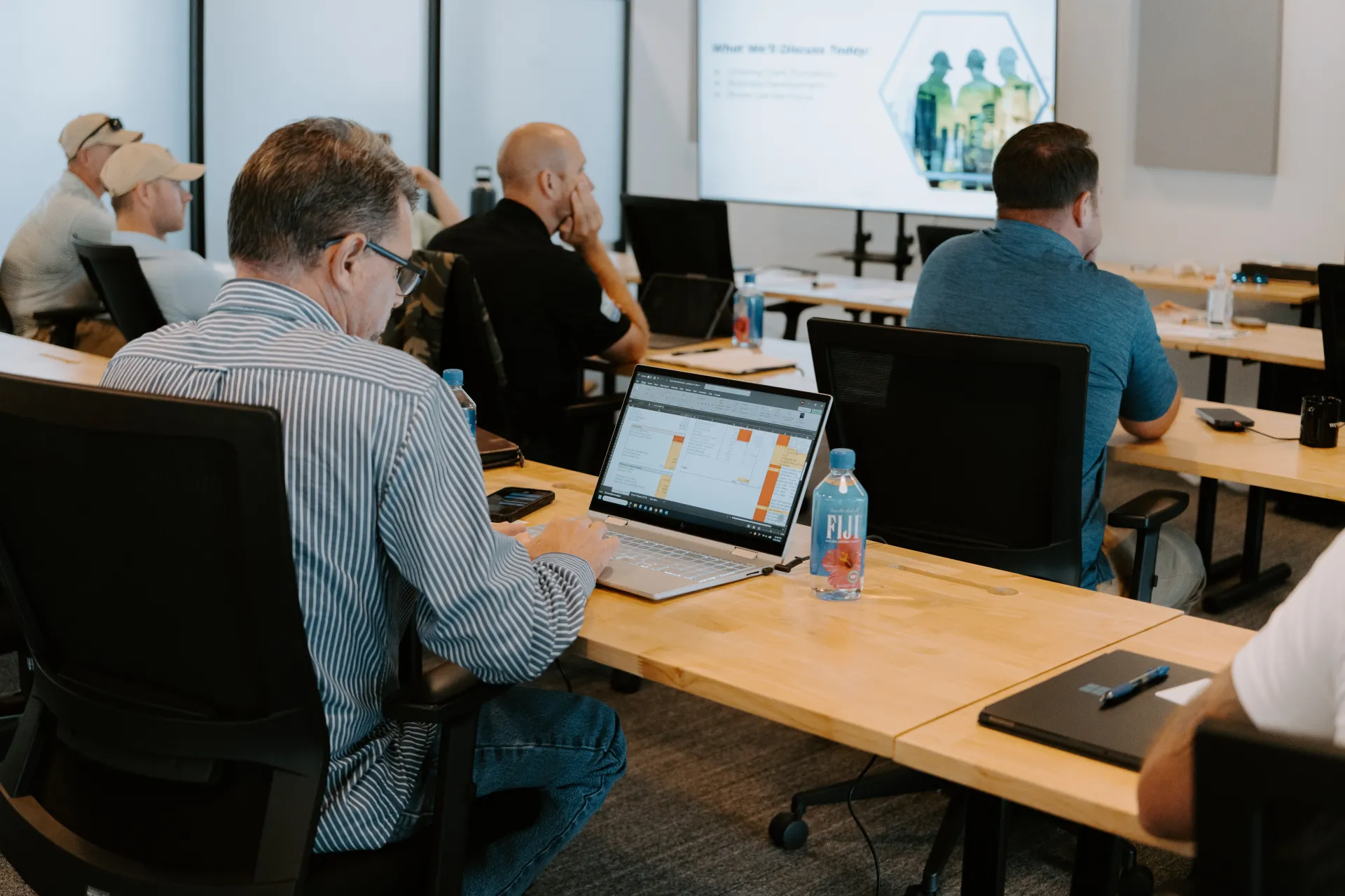 An STG leader running a sales team meeting on site